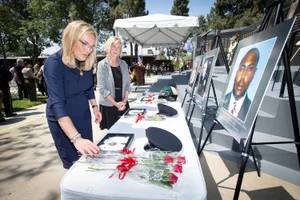Supervisor Hahn and Supervisor Barger looking at a table at the Peace Officers Memorial