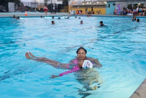 people swimming in the Ted Watkins Park Pool