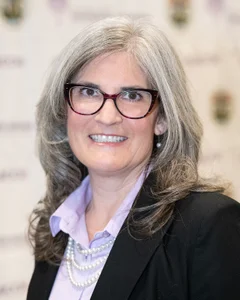 Woman smiling for a photo.