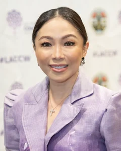 Woman smiling for a photo.