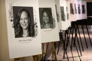 Portrait photos on canvas' lined up.