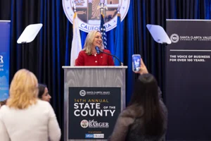 Supervisor Barger speaking at a podium at an event