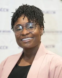 Woman smiling for a photo.