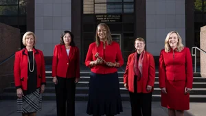 Supervisor group photo dressed in red