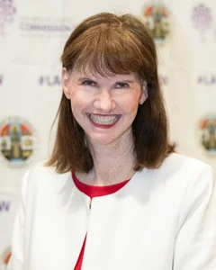 Woman smiling for a photo.