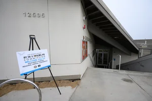 Picture of the outside of a building. 12505 Fish and Wildlife Commission