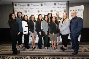 group photo of people smiling.