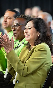 Background photo of Hilda L. Solis