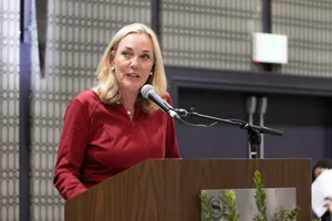 Supervisor Barger speaking at a podium.