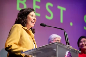 Supervisor Solis Speaking at an event on the podium
