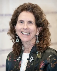 Woman smiling for a photo.