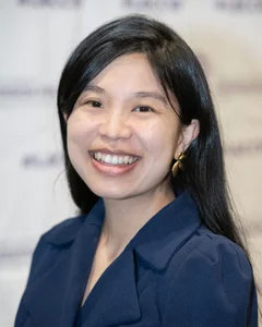 Woman smiling for a photo.