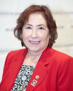 Woman smiling for a photo.