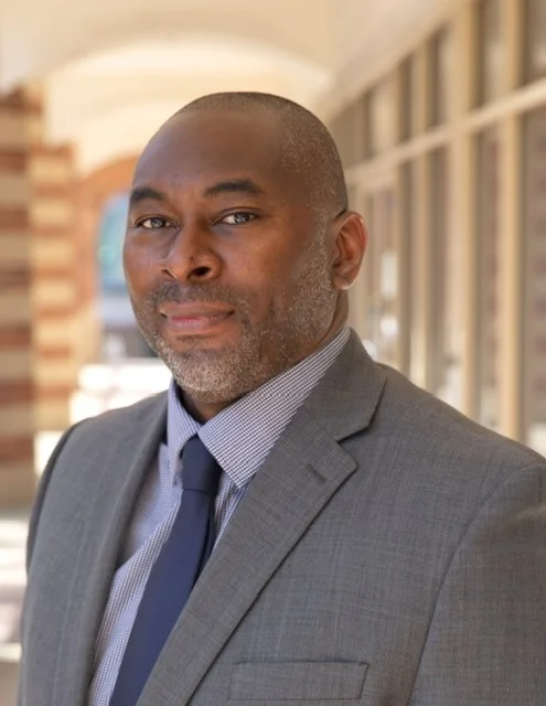 London McBride portrait photo in a suit and tie