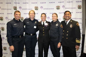 a group photo of county officers smiling.