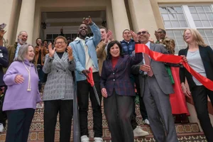 Supervisor Solis ribbon cutting for the Grand opening of LA Room & Board's Project Homekey Sites for Youth