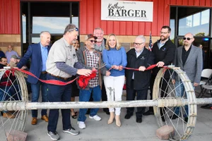 Supervisor Barger cutting a ribbon at the "AV Rural Museum