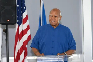 a man standing at the podium