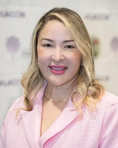 Woman smiling for a photo.