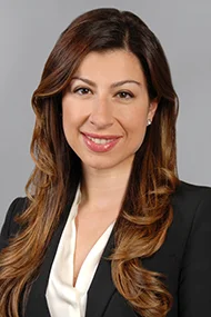 Headshot of Theane Evangelis