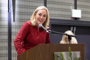 Supervisor Barger speaking at a podium.