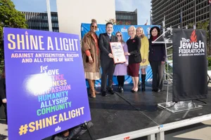 Supervisor Barger group photo on stage at the "Jewish Federation"