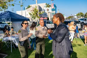 Supervisor Mitchell speaking to police at an event