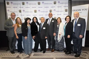 group photo of people smiling.