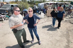 Supervisor Hahn speaking to worker at the Homeless Connect South Gate