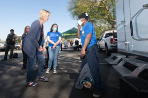 Supervisor Hahn speaking to someone at Homeless Connect South Gate