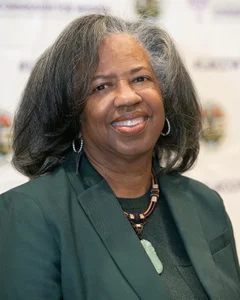 Woman smiling for a photo.