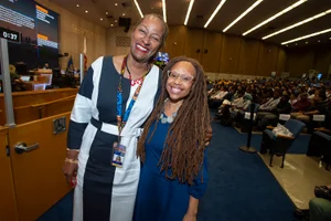 Supervisor Mitchell smiling with another woman