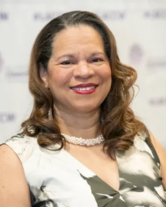 Woman smiling for a photo.