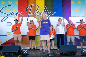 Supervisor Hahn speaking at a San Pedro Pride event