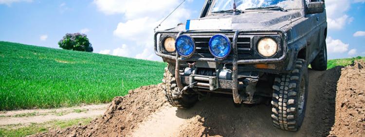 Off-road vehicle driving in the mud
