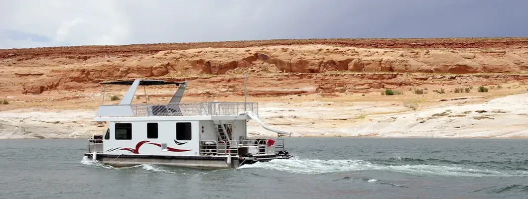 Houseboat floating. Find New Mexico Boat Insurance.