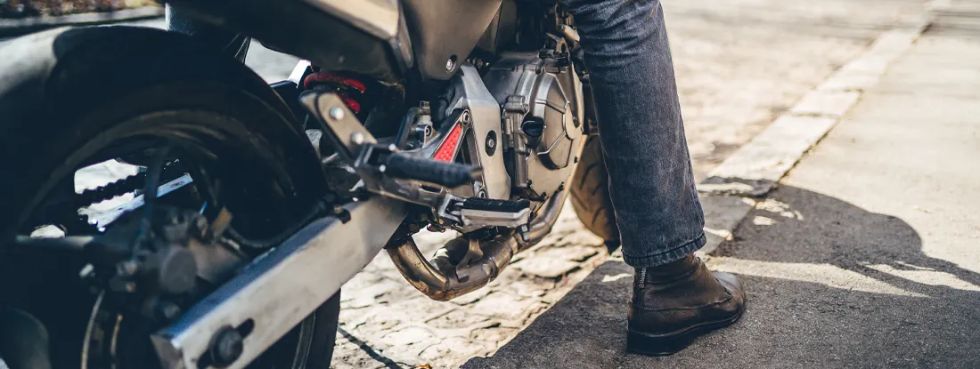 Man sitting on his motorcycle. Find New Jersey Motorcycle Insurance.