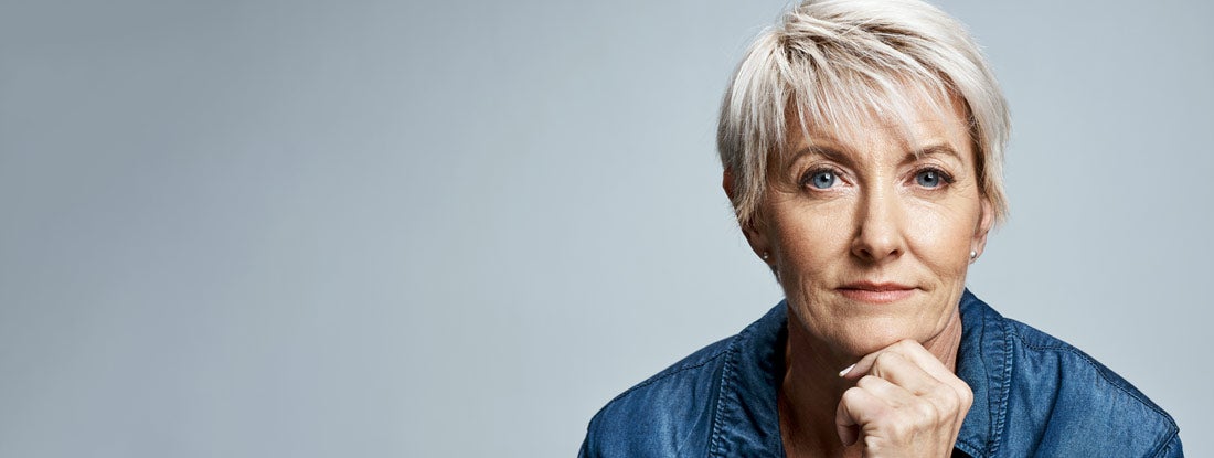 Professional female leaning forward. Single Life Annuity.