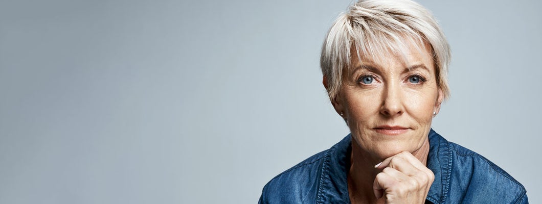 Professional female leaning forward. Single Life Annuity.