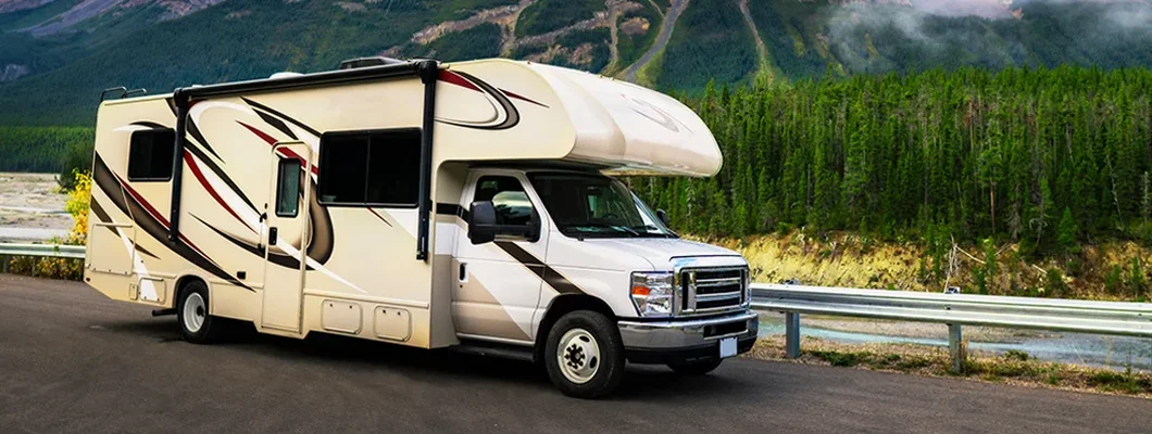 Motorhome on a vacation getaway in nature. Find North Dakota RV insurance.