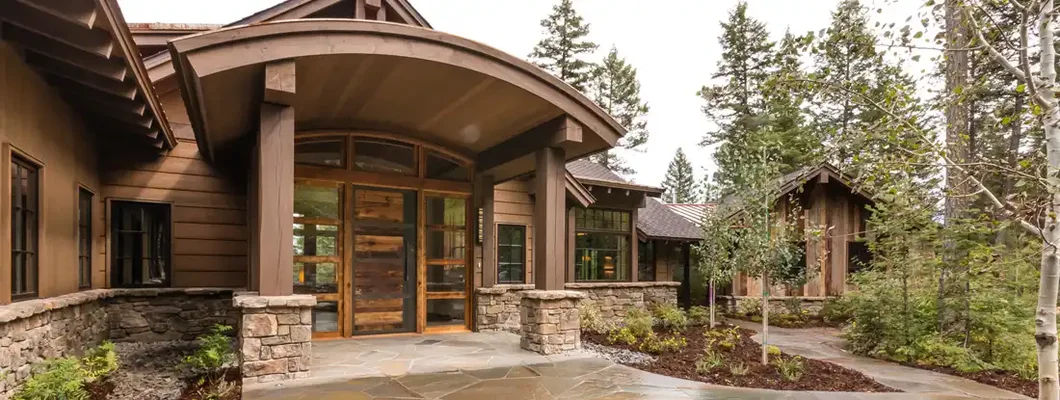 New home with large extending front porch. How to Find the Best Homeowners Insurance in Sheridan, Wyoming.