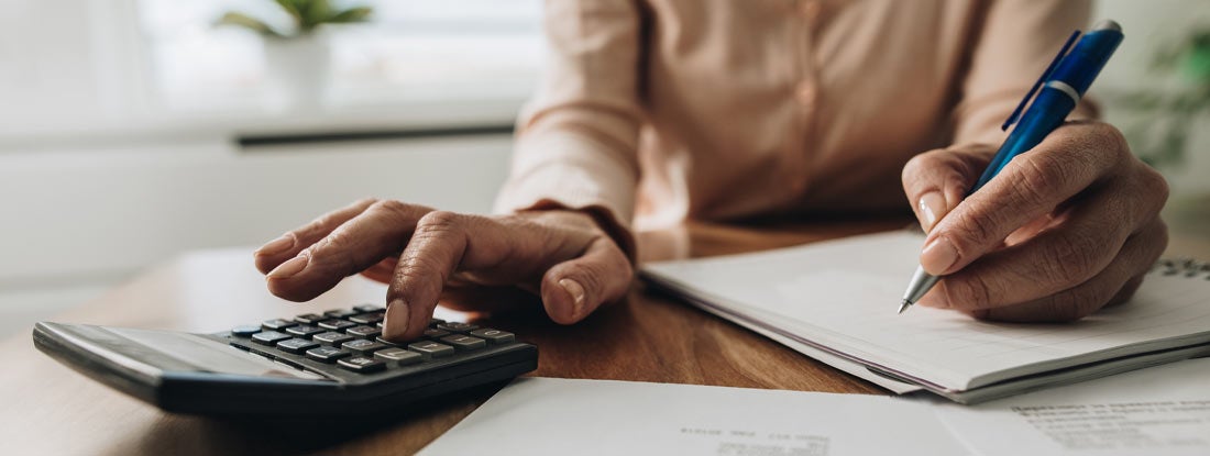 Woman managing their personal or business finances. Future value annuity formula.