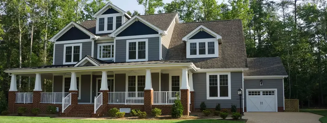 Exterior of house in suburbs. How to Find the Best Homeowners Insurance Policy in West Linn, Oregon. 