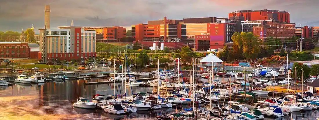 Erie, Pennsylvania downtown on the bayfront at dusk. Find Pennsylvania Boat Insurance.