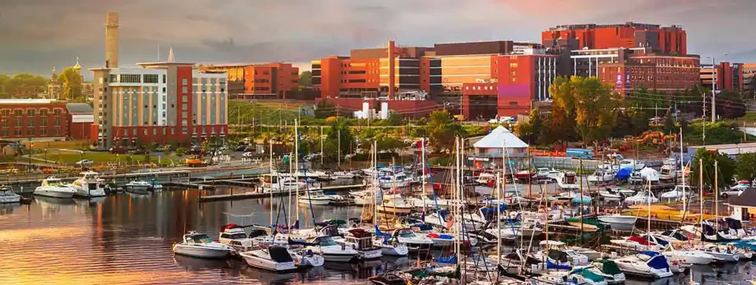 Erie, Pennsylvania downtown on the bayfront at dusk. Find Pennsylvania Boat Insurance.