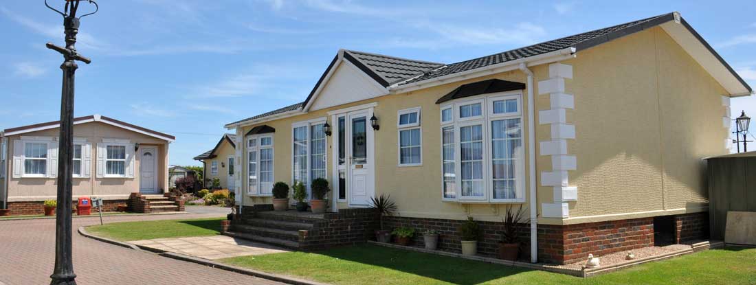 Fancy residential mobile home on beautiful property. Mobile Home Insurance Claims.