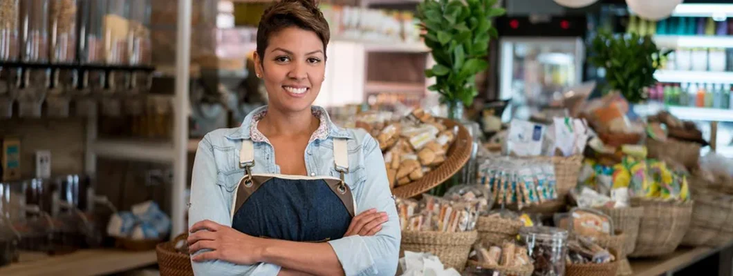 Female store business owner. Find La Vista, Nebraska Business Insurance.