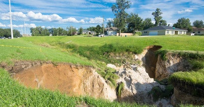 Large Florida Sinkhole Near Residential Neighborhood. Find Sinkhole Insurance.
