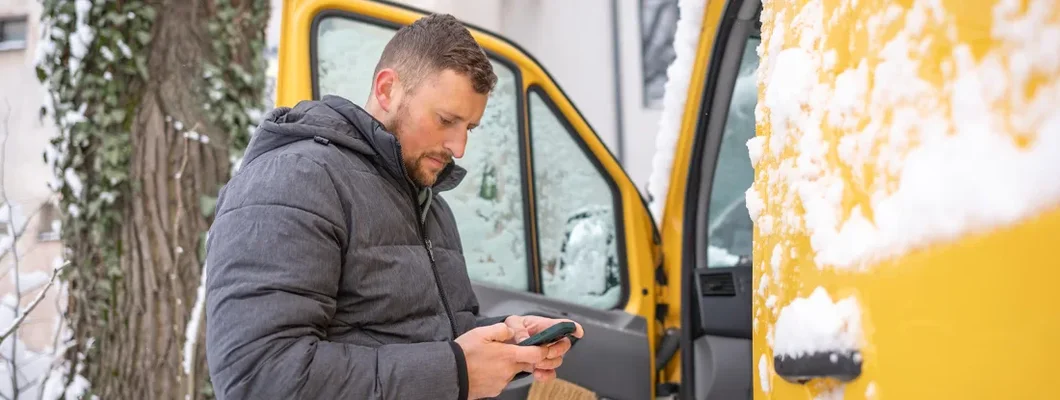 Preparing to do some delivery on a cold and snowy day. Michigan Commercial Vehicle Insurance. 