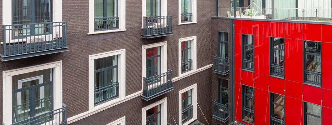 Residential area with modern apartment buildings. Find North Dakota renters insurance.